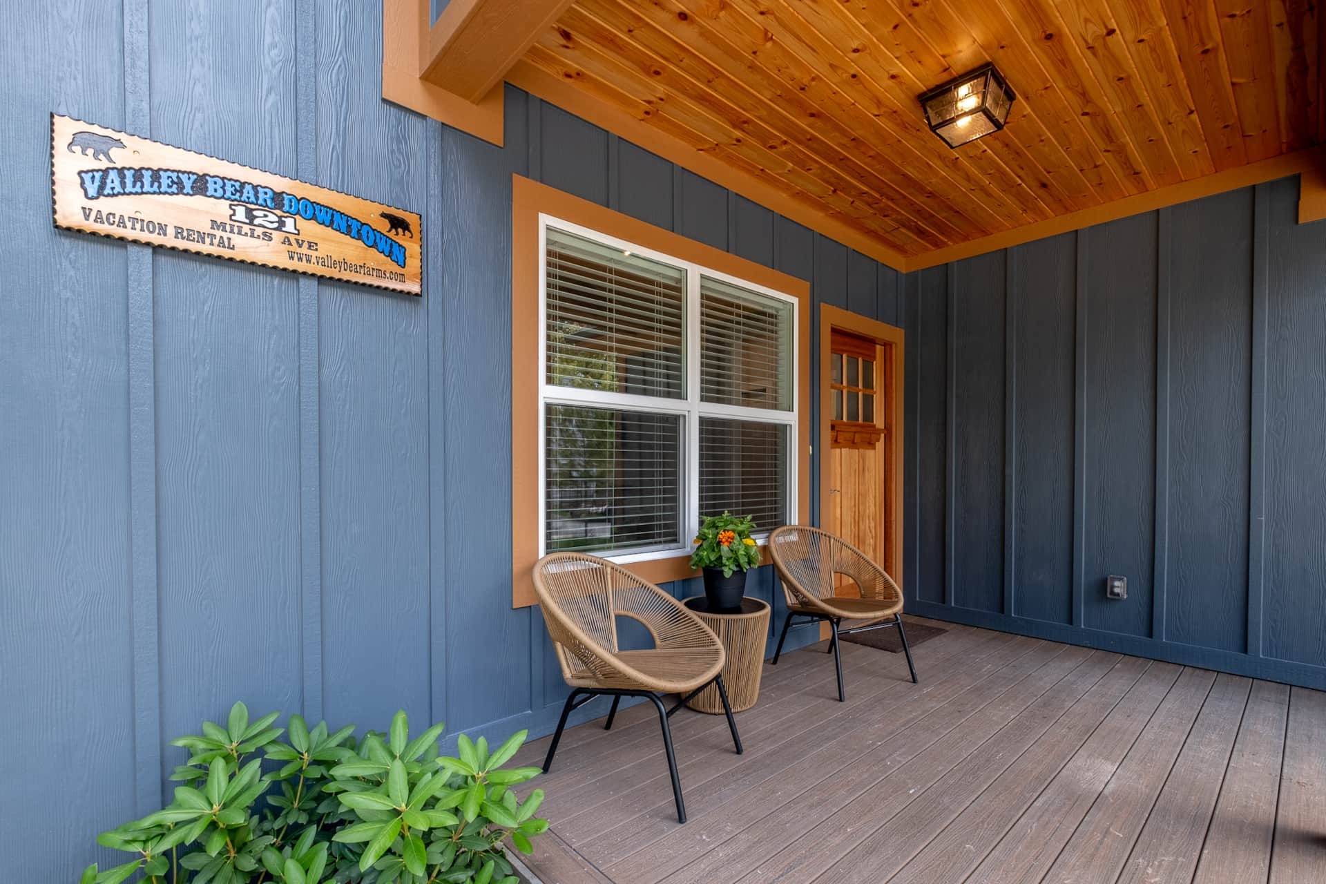 Front porch with Valley Bear Downtown sign