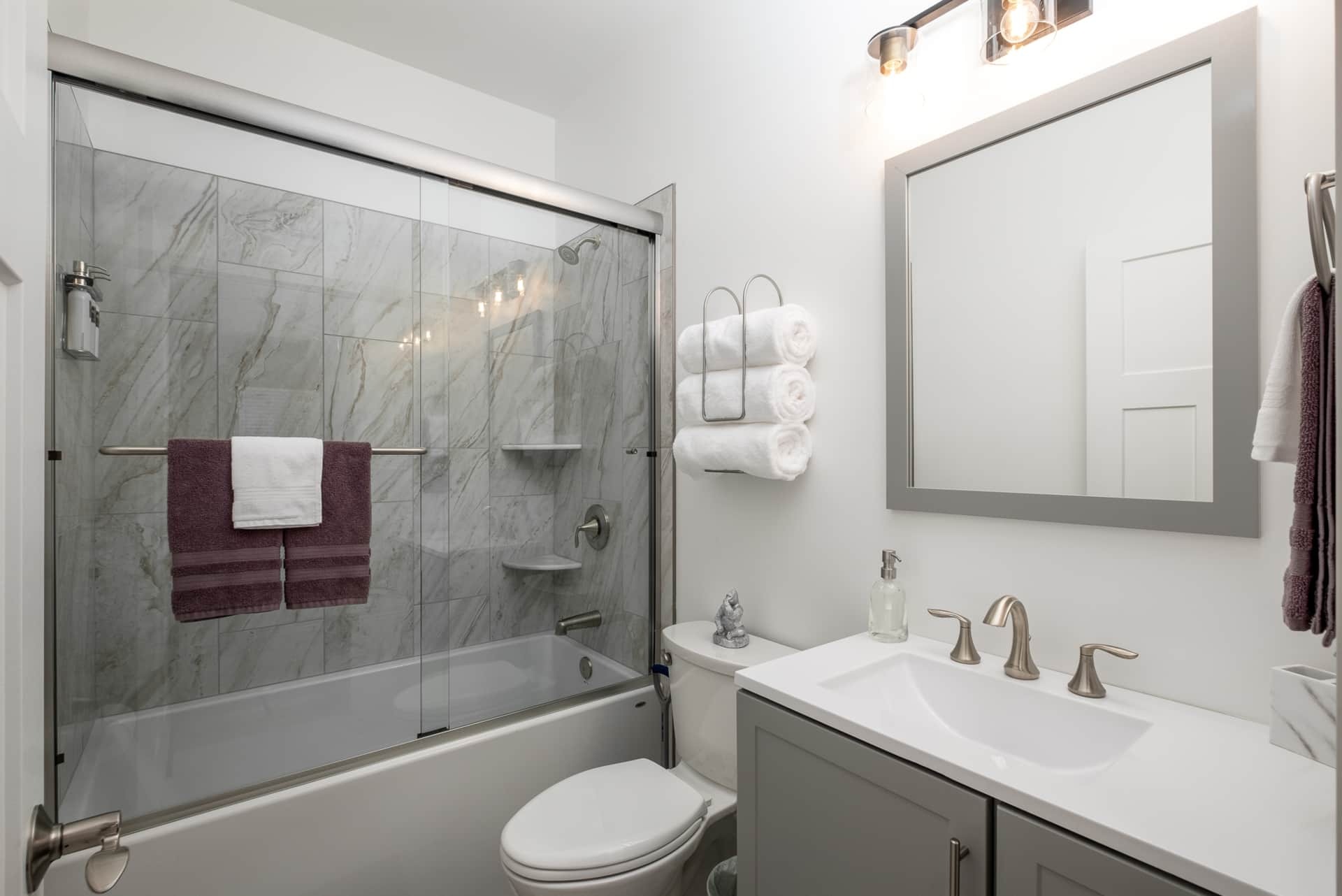 Bathroom with tub and shower combo