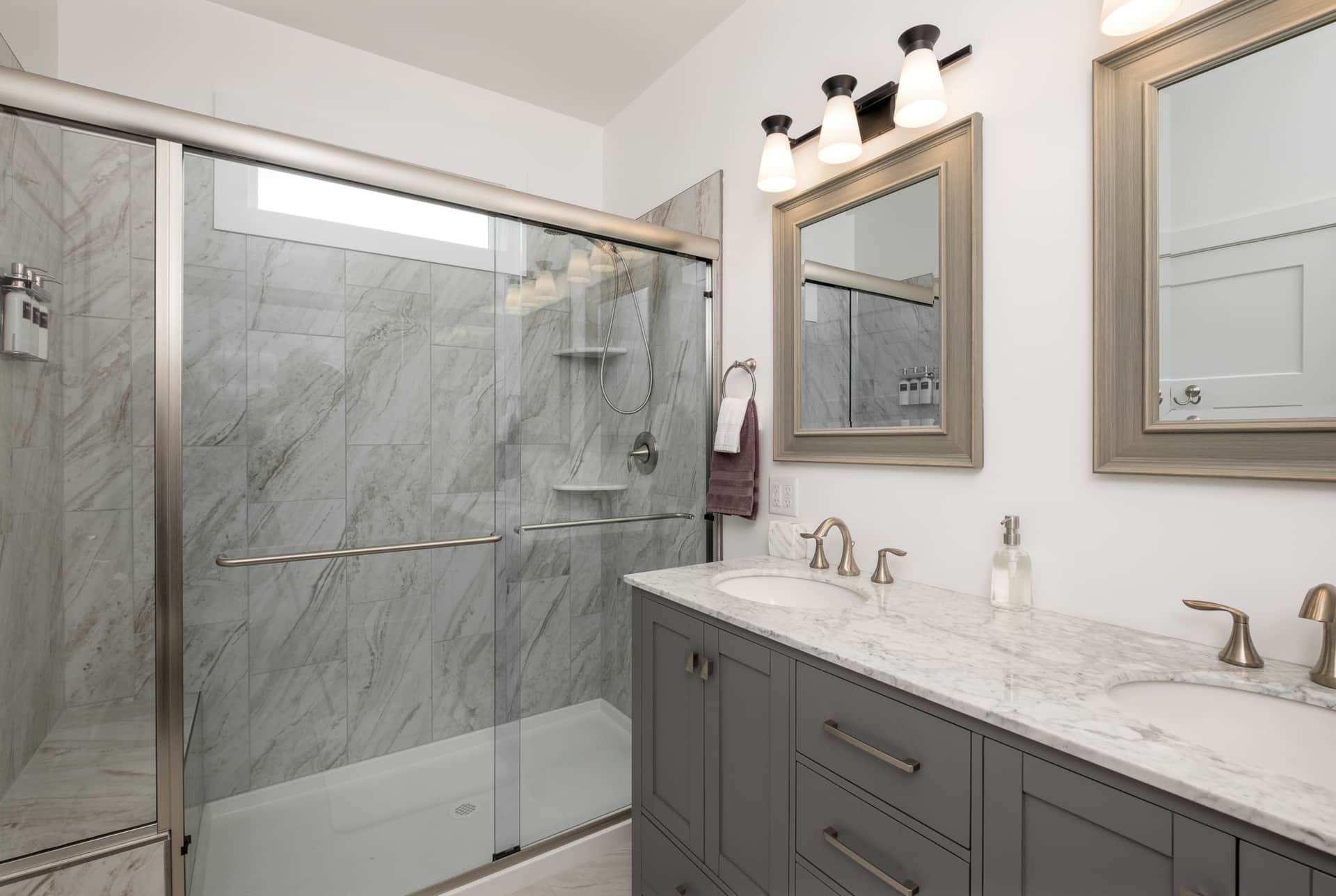 Bathroom with walk-in shower and double vanity