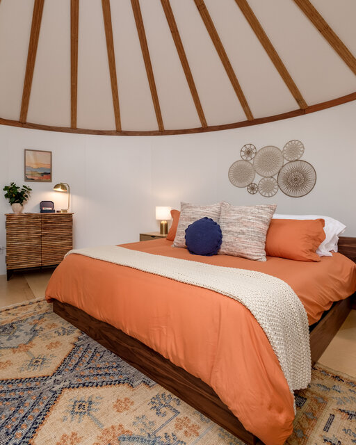 Creekside Yurt king bed interior